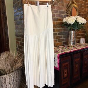 Elegant ivory two piece set Strapless top, pleated skirt. Faux leather.